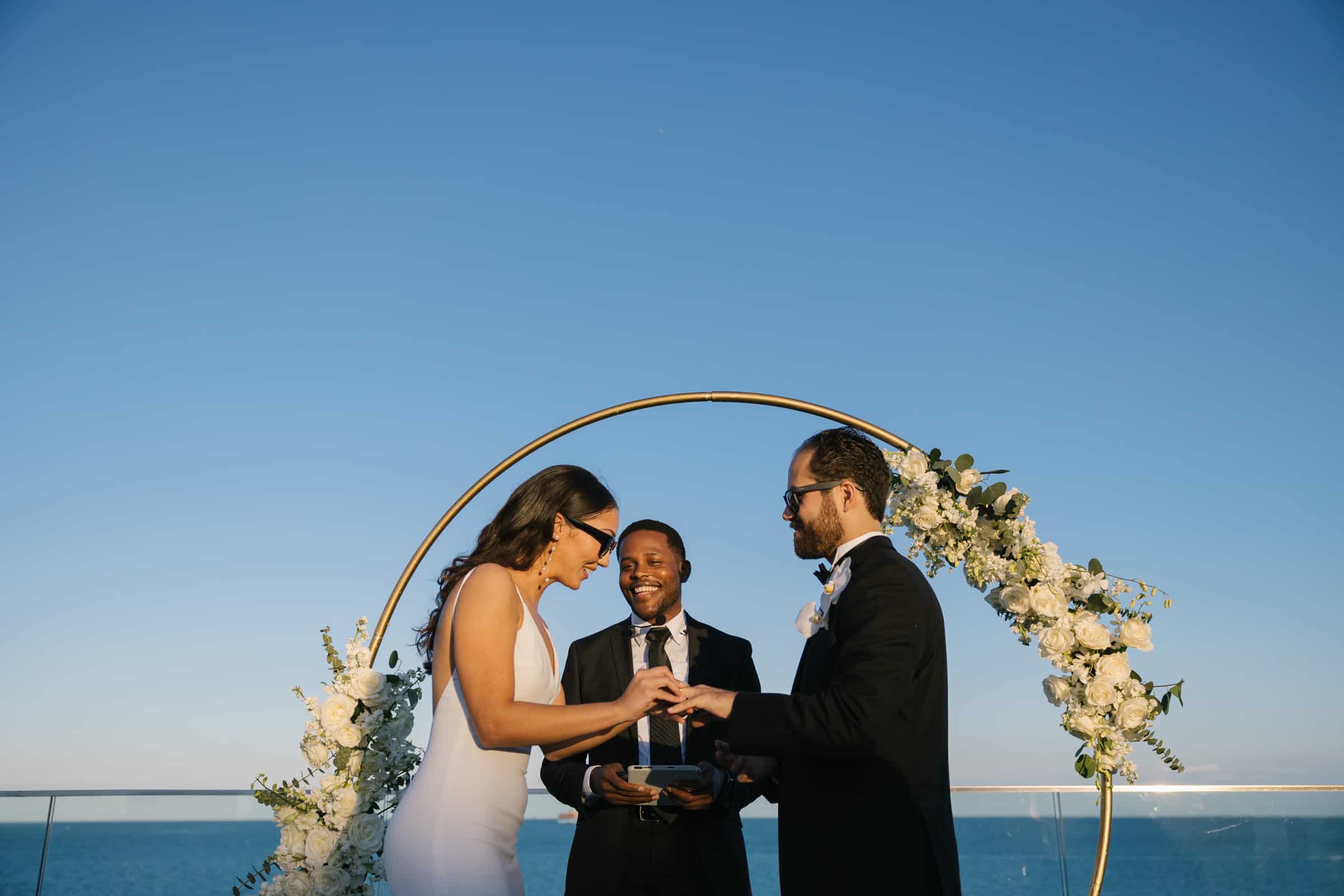 Couple getting married at the Rooftop of the Nautilus by Arlo Hotel 