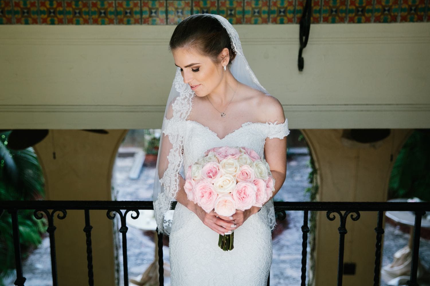 Bride getting ready at Villa Woodbine. Lace Wedding Gown