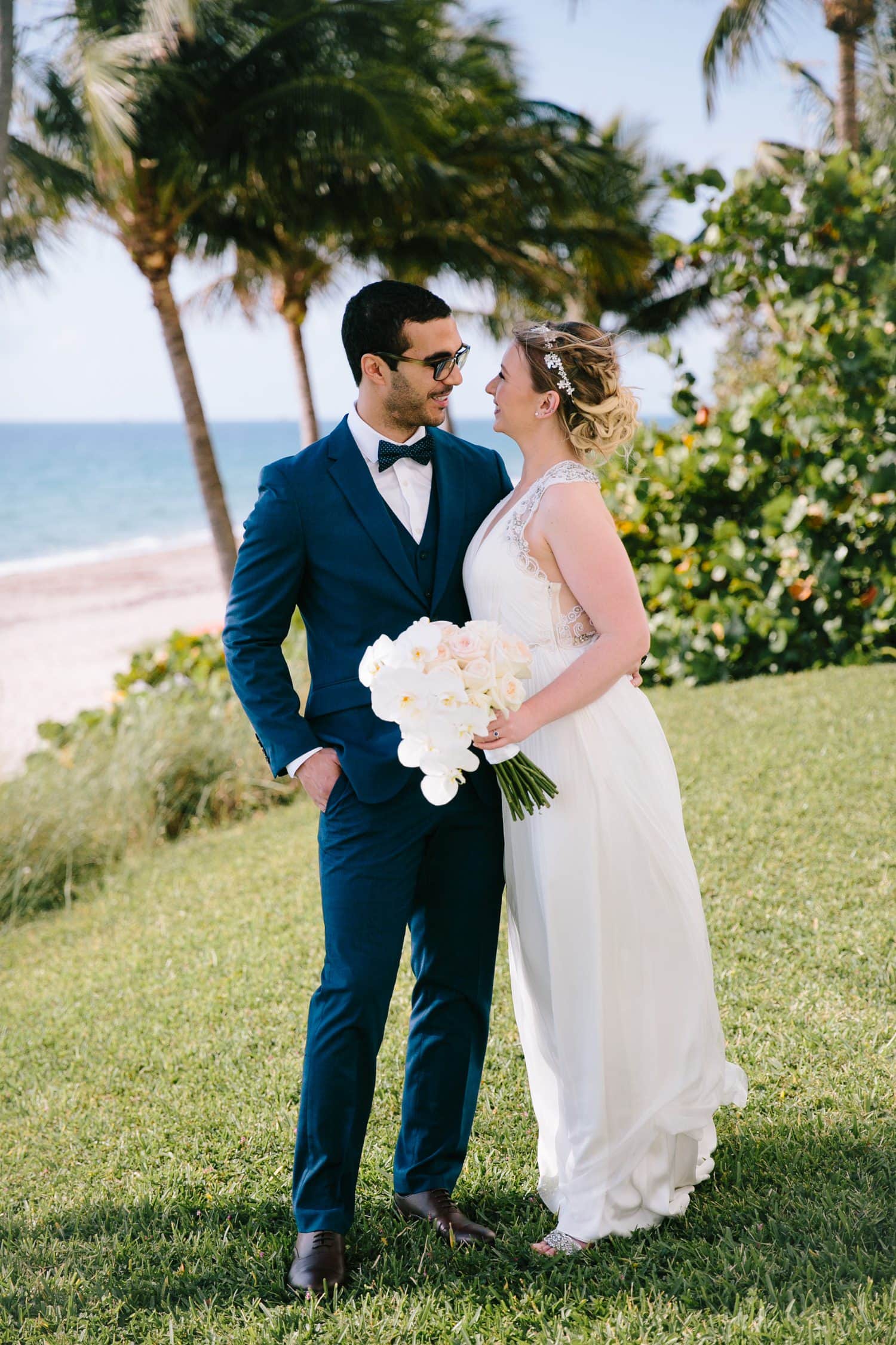 Bride and groom portraits. Pelican Grand Beach Resort Brunch Wedding