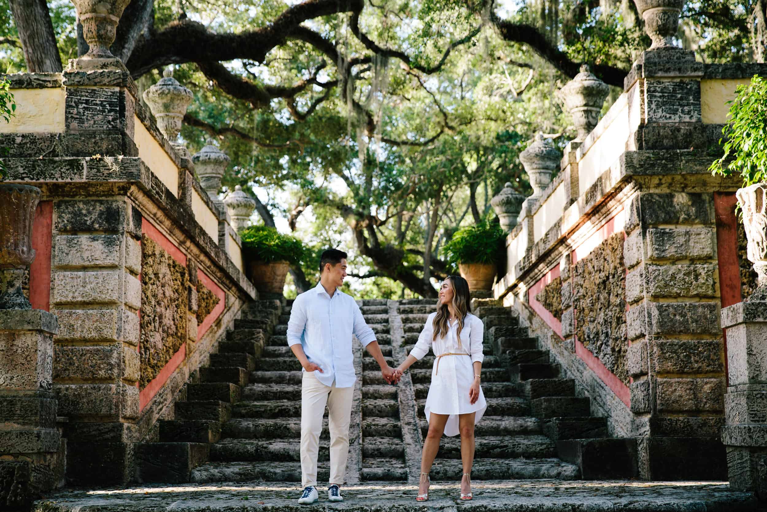 romantic photo of a couple during their engagement session at Vizcaya in Miami 