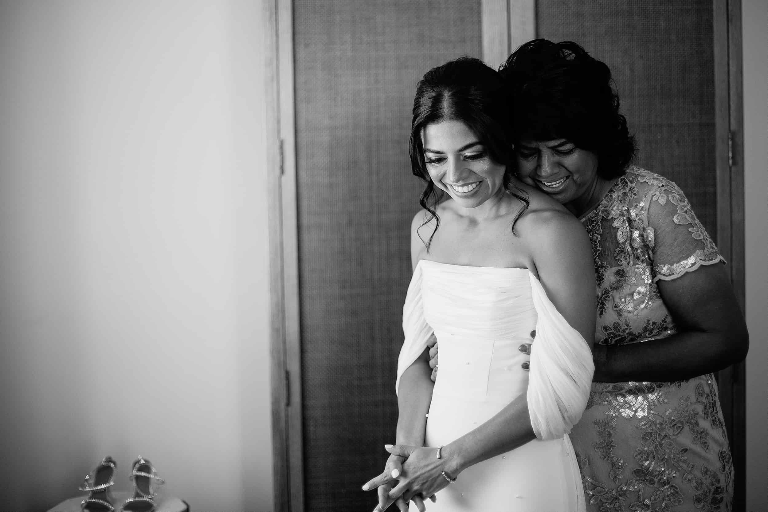 Bride and her mother getting ready for a wedding 