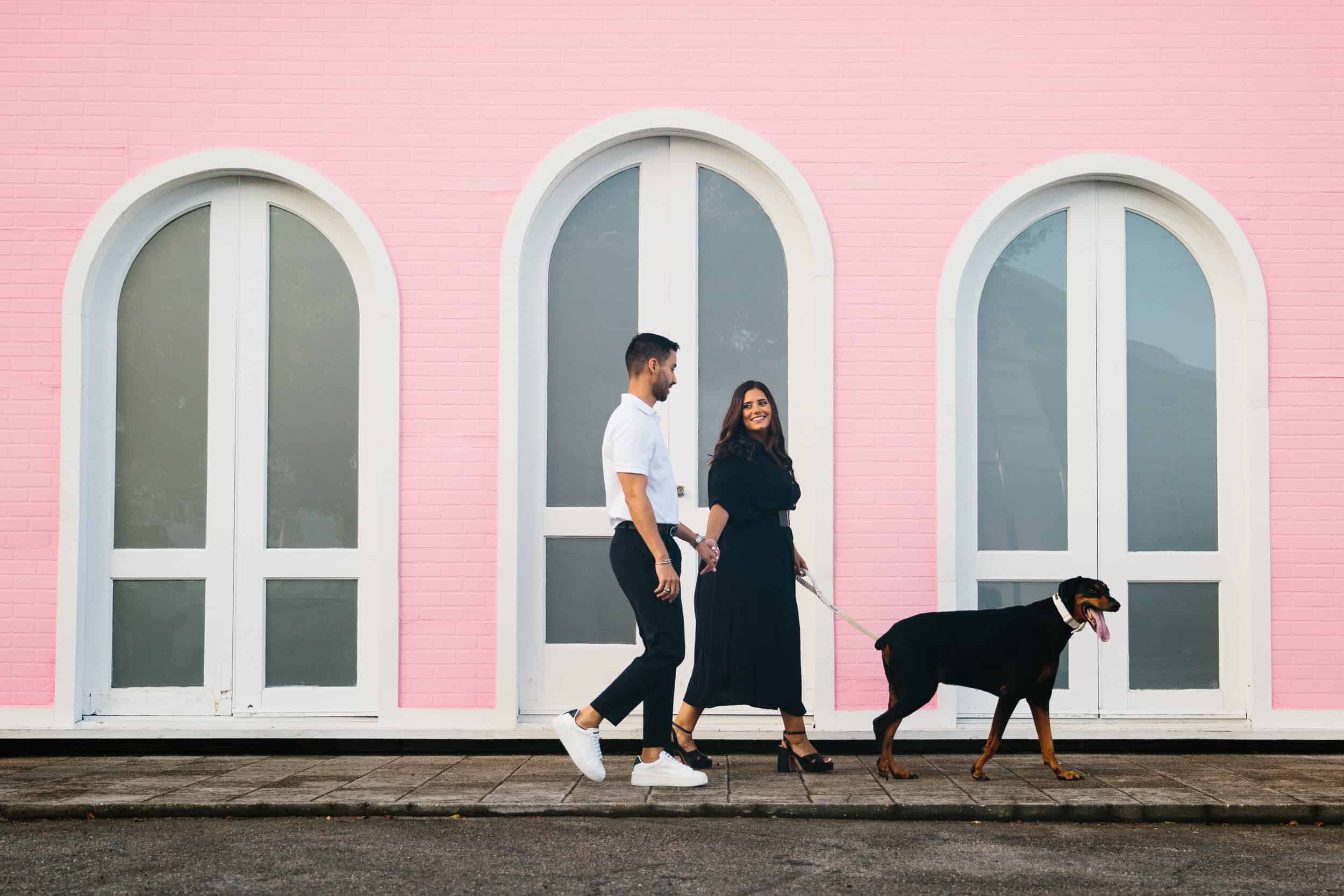 Couple walking their dog at Little River Studios in Miami 