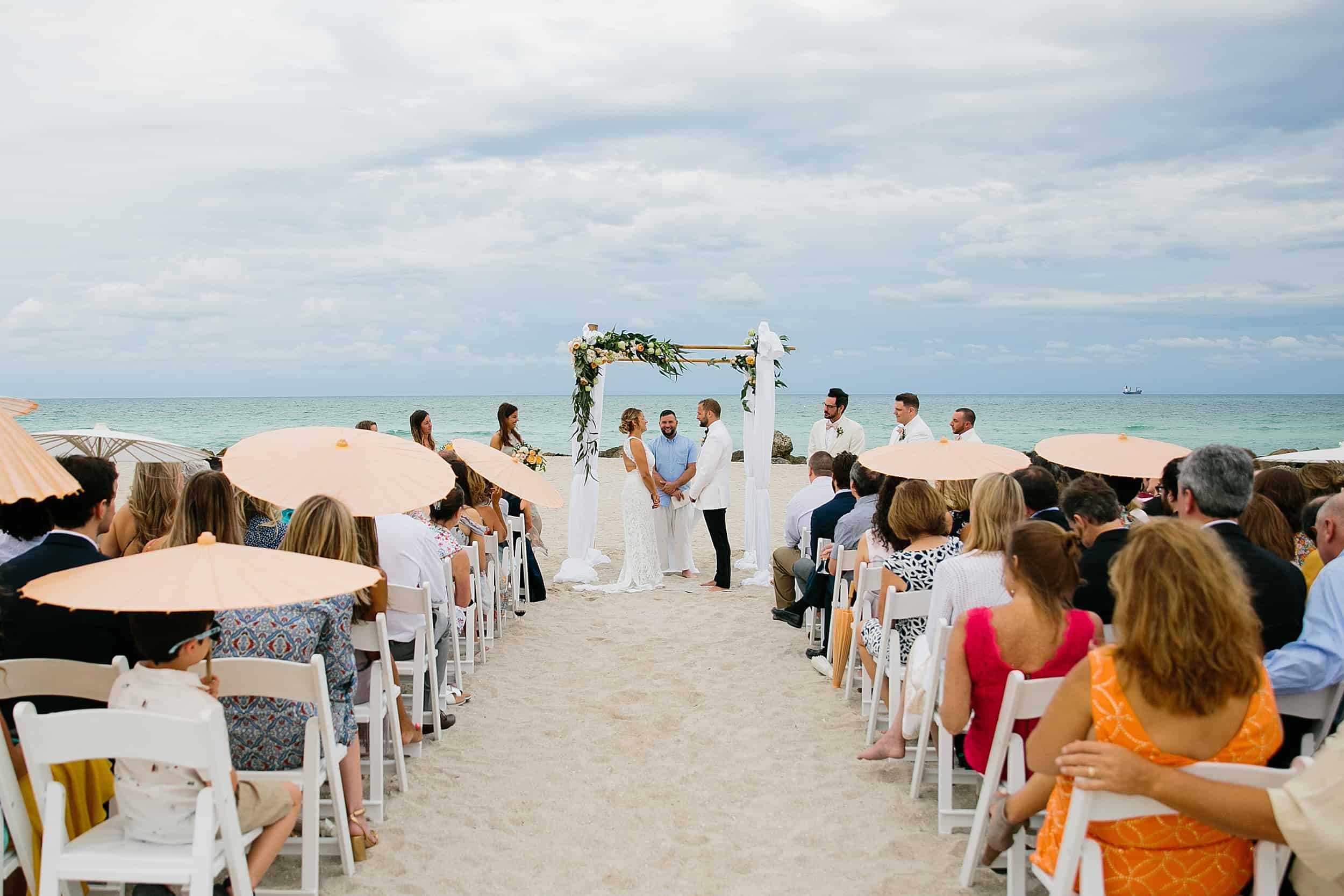 Beach wedding ceremony at The Palms Hotel & Spa